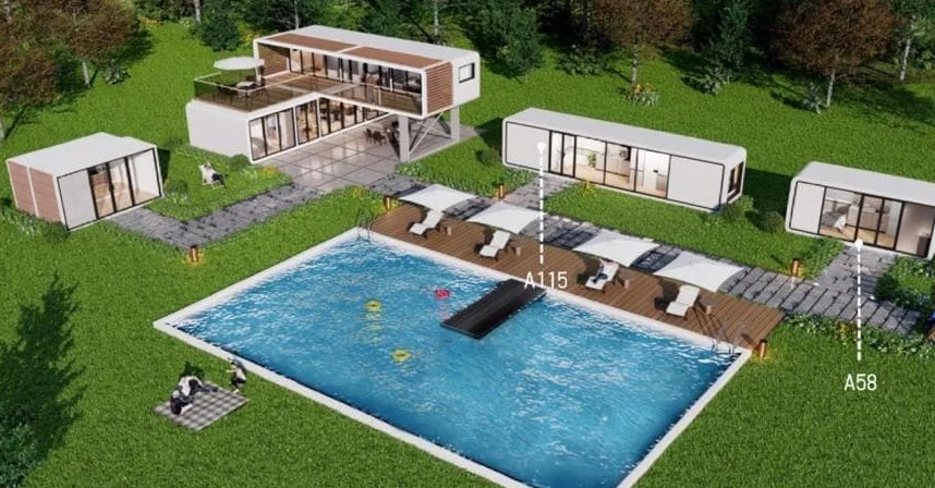 Prefabricated cabin houses arranged around a swimming pool